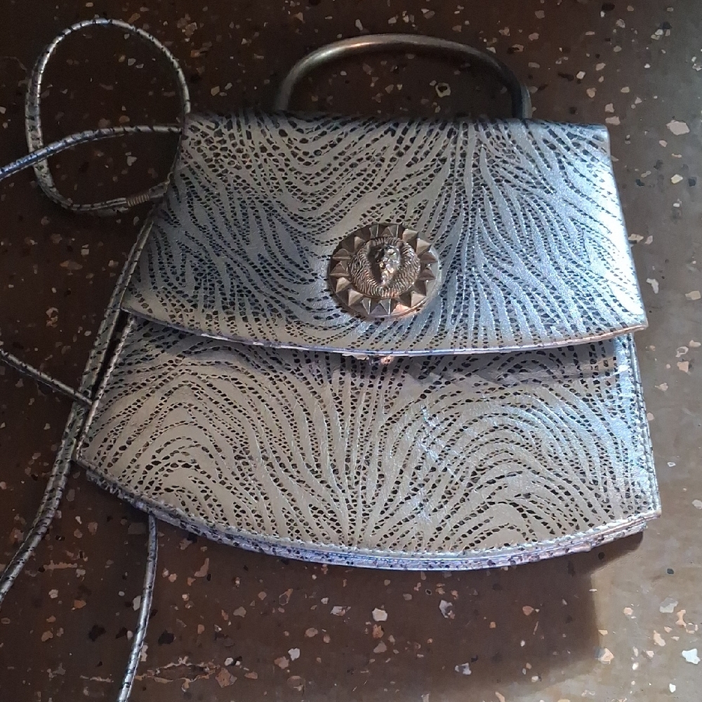 Metallic Silver Women's Crossbody Bag with Decorative Medallion